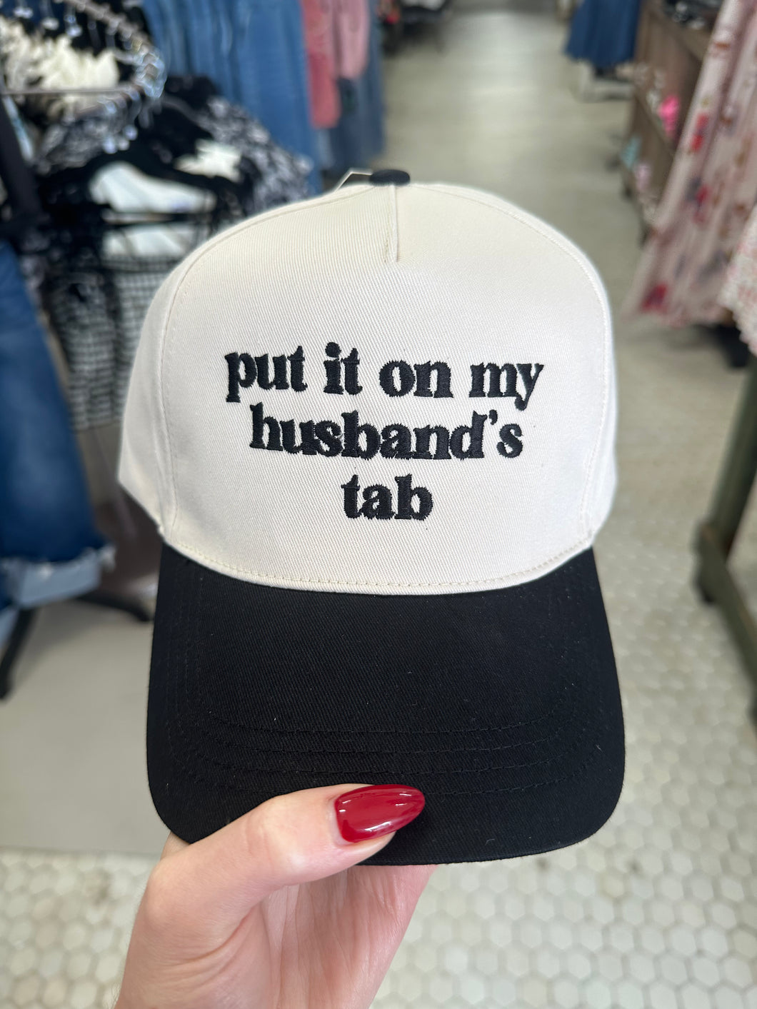 Put It On My Husband's Tab Embroidered Trucker Hat
